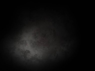 Ortada siyah bir nokta olan siyah bir arkaplan.