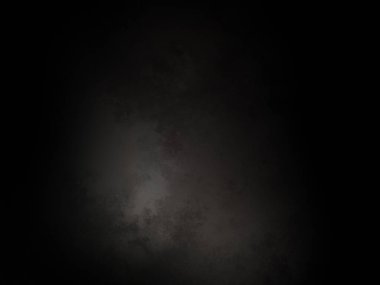 Ortada siyah bir nokta olan siyah bir arkaplan.