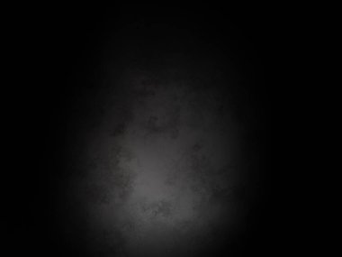 Siyah bir arka plan ve köşeden gelen bir ışık.