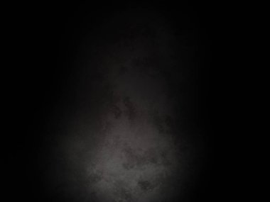 Siyah bir arka plan ve köşesinde bir ışık parlıyor.