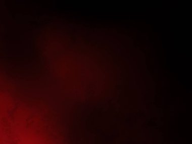 Karanlık bir odada parlayan kırmızı bir ışık.