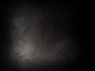 Ortada siyah bir nokta olan siyah bir arkaplan.