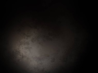 Ortada siyah bir nokta olan siyah bir arkaplan.