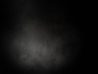 Siyah bir duvar ve içinden bir ışık geçiyor.