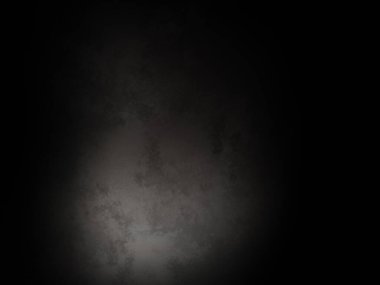 Karanlıkta parlayan bir ışıkla siyah bir arkaplan.