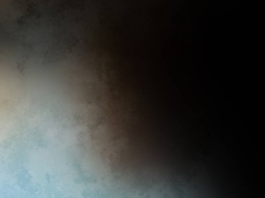 Elinde cep telefonu olan takım elbiseli ve kravatlı bir adam.