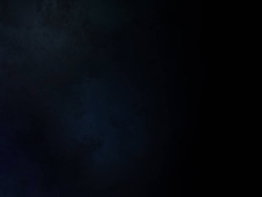 Elinde mikrofon tutan takım elbiseli ve kravatlı bir adam.