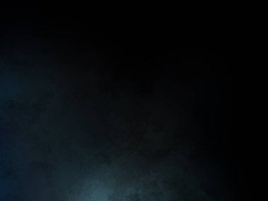 Takım elbiseli ve kravatlı bir adam karanlık bir arka planın önünde duruyor.