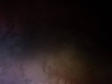 koyu bir arkaplan ve renkli bir ışık