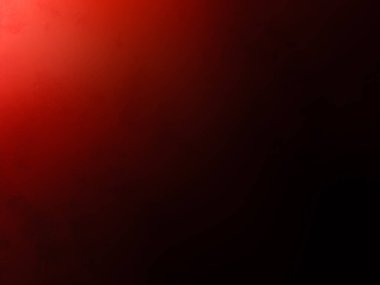 Karanlık bir odada parlayan kırmızı bir ışık.