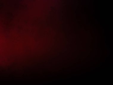 Karanlık bir odada parlayan kırmızı bir ışık.