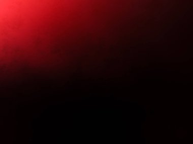 Karanlık bir odada parlayan kırmızı bir ışık.