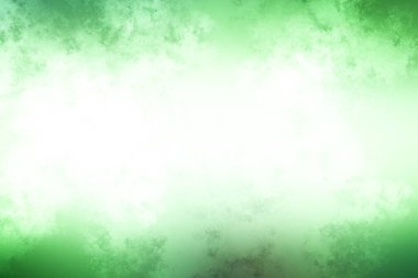 bulanık bir görüntüye sahip yeşil ve beyaz bir arkaplan