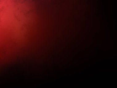 Karanlık bir odada parlayan kırmızı bir ışık.