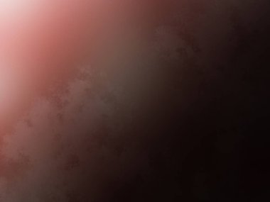 Elinde cep telefonu olan takım elbiseli ve kravatlı bir adam.