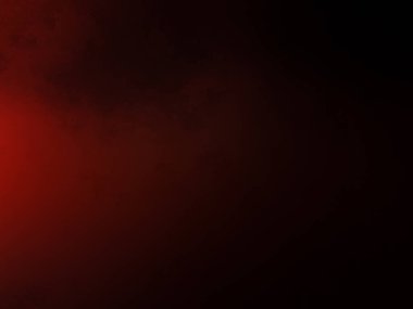 Karanlıkta siyah arka planı olan kırmızı bir ışık.