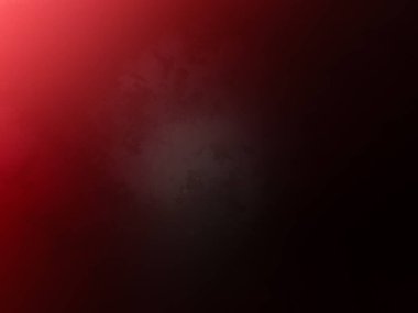 Karanlık bir odada parlayan kırmızı bir ışık.