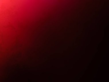 Elinde mikrofon tutan takım elbiseli ve kravatlı bir adam.