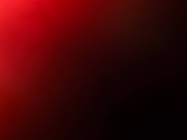 Siyah arkaplanı olan kırmızı bir ışık