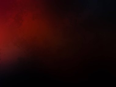 Kırmızı ve mavi arka planda duran takım elbiseli ve kravatlı bir adam.