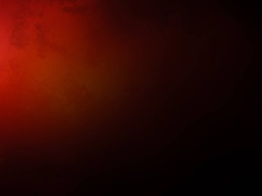 Karanlıkta siyah arka planı olan kırmızı bir ışık.