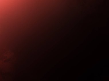 Karanlık gökyüzünde parlayan kırmızı bir ışık.