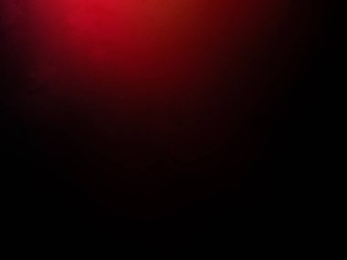 Karanlıkta siyah arka planı olan kırmızı bir ışık.