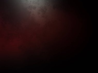 Kırmızı ve siyah bir arkaplan ve tepeden gelen bir ışık.