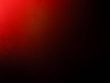 Elinde mikrofon tutan takım elbiseli ve kravatlı bir adam.