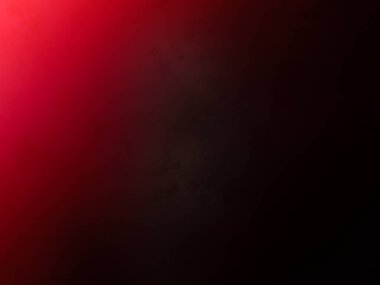 Siyah arkaplanı olan kırmızı bir ışık