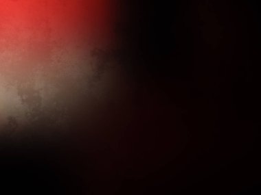 Kırmızı kravat takan takım elbiseli bir adam.