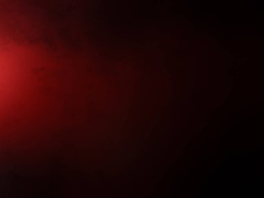 Karanlık bir odada parlayan kırmızı bir ışık.