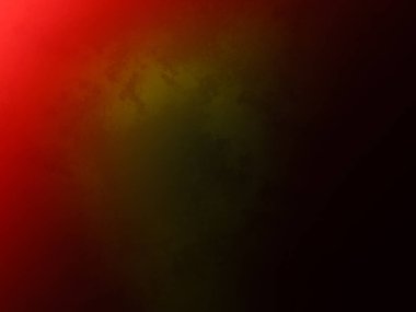 Siyah arkaplanı olan kırmızı ve yeşil bir elma.