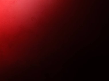 Siyah arka planı ve kırmızı ışığı olan kırmızı bir duvar.