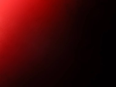 Elinde mikrofon tutan takım elbiseli ve kravatlı bir adam.