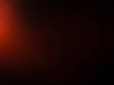 Karanlıkta siyah arka planı olan kırmızı bir ışık.