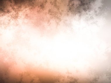 Bulutlu bir yüzeyde kaykay süren bir insan.