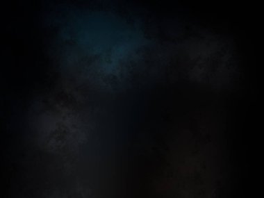 Siyah bir arka planın önünde duran takım elbiseli ve kravatlı bir adam.