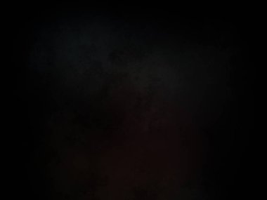 Ortasında kırmızı ışık olan siyah bir arkaplan