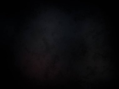 Ortasında kırmızı ışık olan siyah bir arkaplan