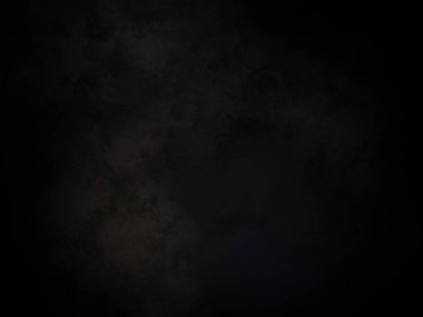 Siyah bir arkaplan, koyu gökyüzü ve beyaz bir ışık.