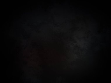 Merkezinde kırmızı nokta olan siyah bir arkaplan.