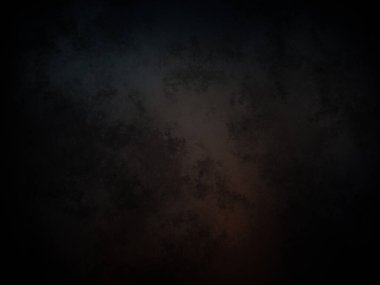 Siyah ve turuncu ışıklı koyu bir arka plan.