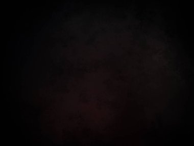 Karanlıkta siyah arka planı olan kırmızı bir ışık.