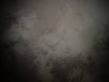 Bir duvarın siyah beyaz fotoğrafı.