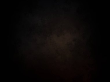 Kara bir arka plan, karanlık bir gökyüzü ve birkaç bulut.