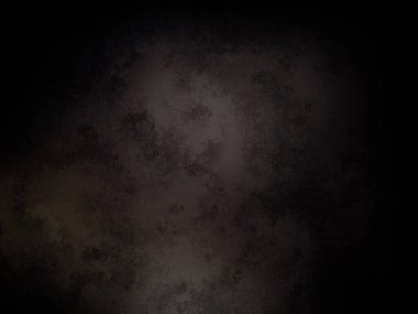 Ortada siyah bir nokta olan siyah bir arkaplan.