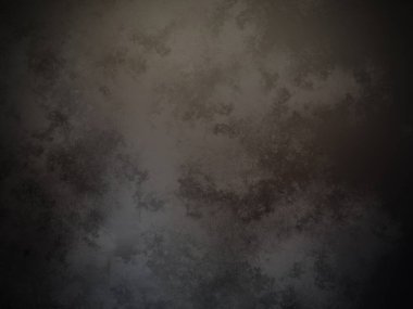 Bir duvarın siyah beyaz fotoğrafı.