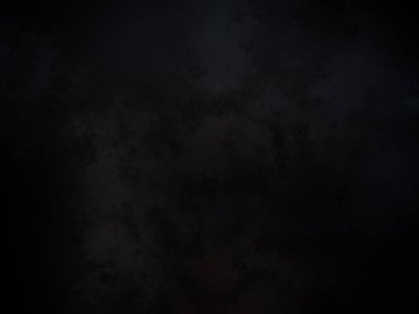 Kara bir arka plan, karanlık bir gökyüzü ve birkaç bulut.