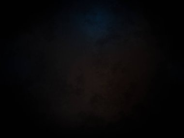 koyu bir arkaplan ve mavi ve siyah bir ışık